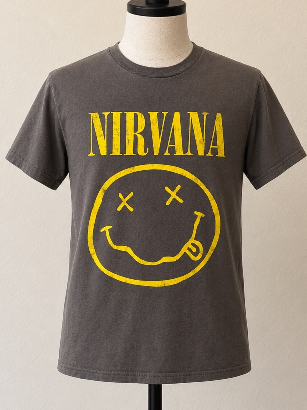 NIRVANA Charcoal Tee with Yellow Smiley Graphic